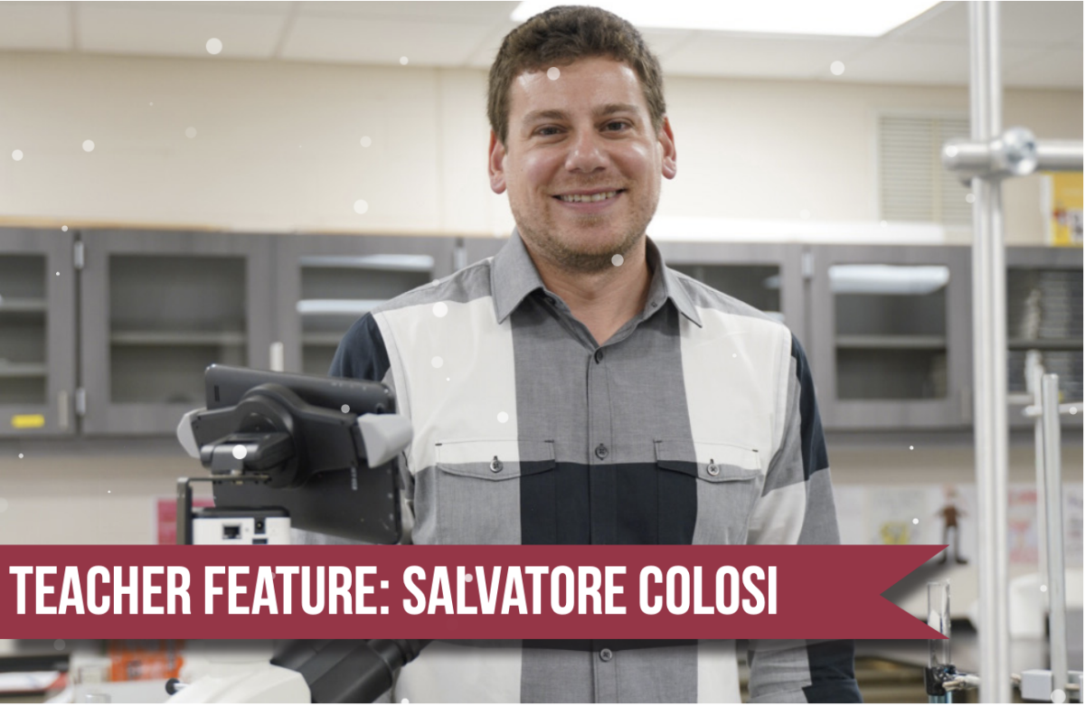 Zooming in: Chemistry and forensics teacher Salvatore Colosi stands next to his double-lens Wi-Fi microscope, his favorite piece of forensic lab equipment. Colosi began his teaching career at Conestoga 12 years ago and has taught in the science department ever since.